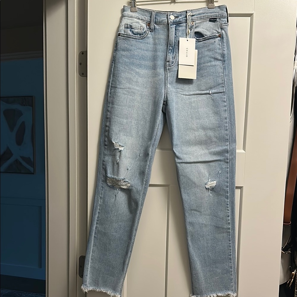 Women's Light Blue Distressed Jeans